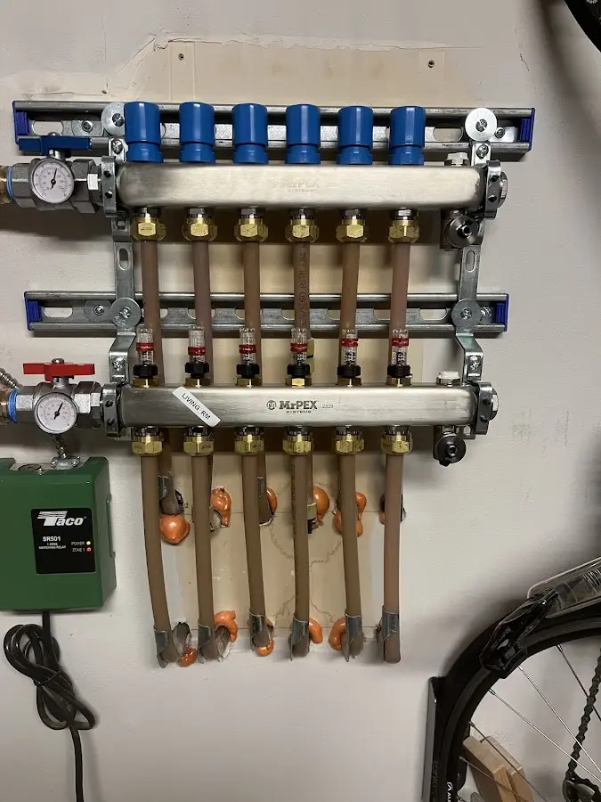 Plumber performing Water Heater Repair at a residential property in Elizabethtown